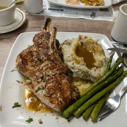 Radio Road Bistro - Garlic butter pork chops with mashed potatoes and asparagus.