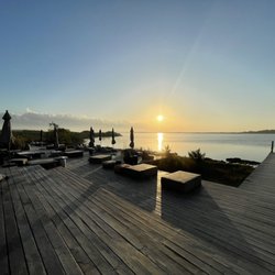 Eugene Toriko - Sunrise views from the deck at Habitas Bacalar.  We spent a lot of time here enjoying great vibes and soaking up the sun!