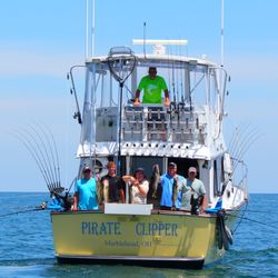 Lake Erie Fishing Charters with 'Eye-Catcher Charters - Happy customers holding up a few of the walleye caught!