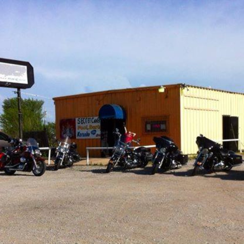 Turnpike Tavern - a row of motorcycles parked in a parking lot - Dive Bars Near Me - Coweta, Oklahoma Turnpike Tavern - a row of motorcycles parked in a parking lot - Dive Bars Near Me - Coweta, Oklahoma