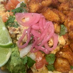 Pink Elephant - Seafood combo Bowl. Fried shrimp,fish and french fries and rice on the bottom of the bowl. Excellent service.