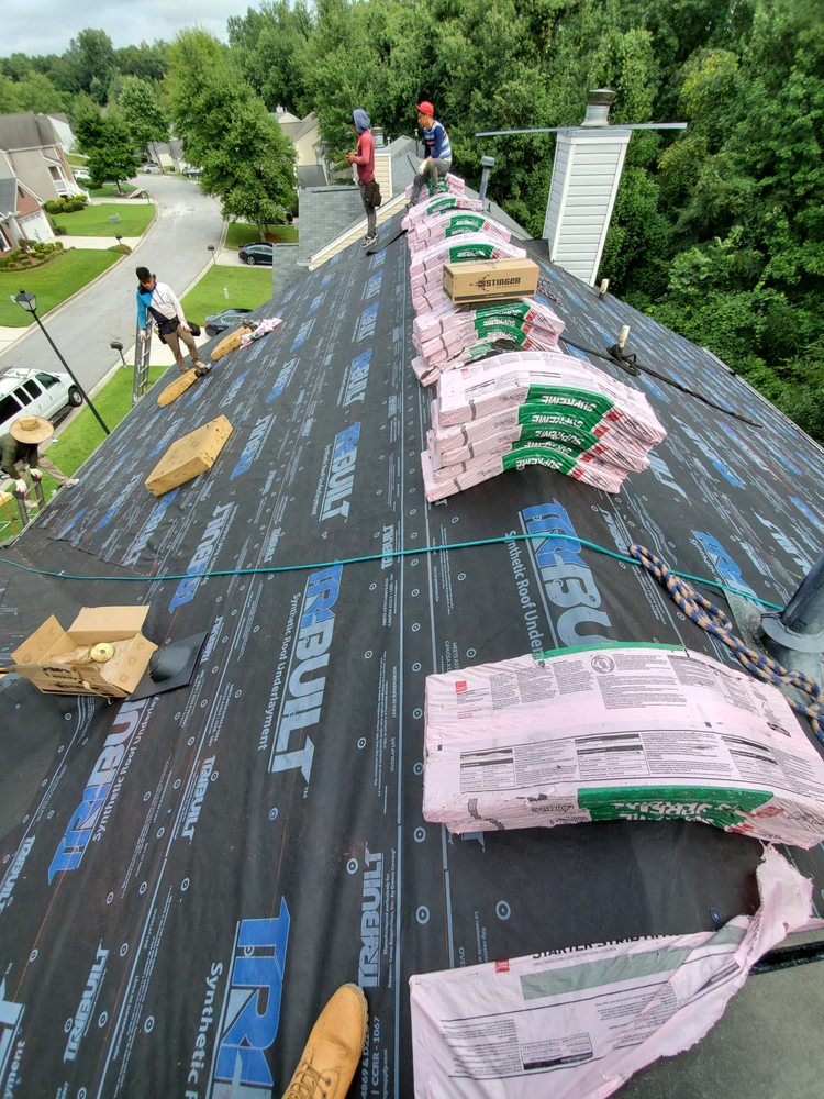 Slide of The Roofing Specialists