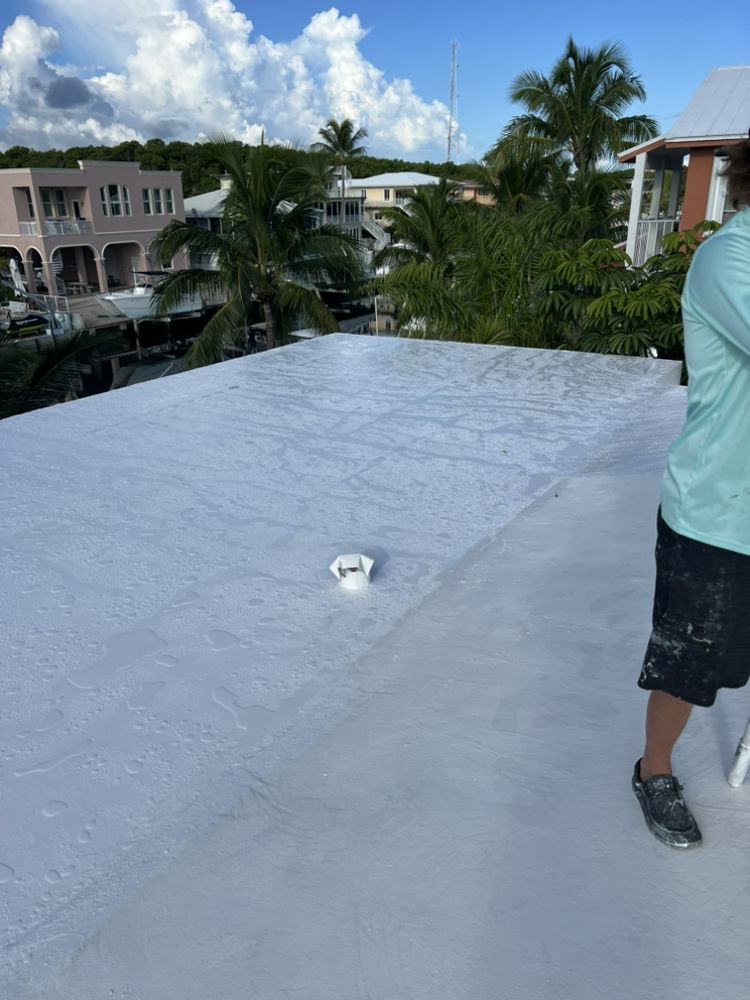 Slide of Andy The Roofer & Co