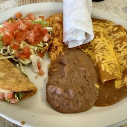 Mexican Plate - 1 taco, 1 tostada, 2 cheese enchiladas, rice, beans, 2 flour tortillas. Mexican Plate - 1 taco, 1 tostada, 2 cheese enchiladas, rice, beans, 2 flour tortillas.