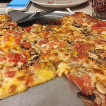 ZaRonis Pizza - Cheese mushroom and tomato - Pizza Near Me - Oshkosh, Wisconsin ZaRonis Pizza - Cheese mushroom and tomato - Pizza Near Me - Oshkosh, Wisconsin