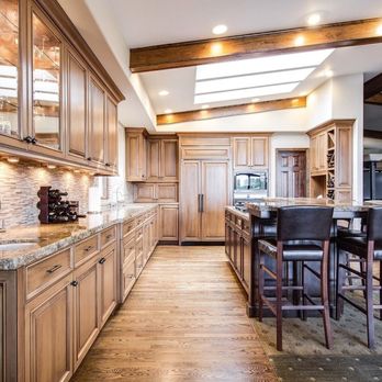 Barrera Construction - a large kitchen with a center island - General Contractors Near Me Barrera Construction - a large kitchen with a center island - General Contractors Near Me