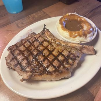 Texas Roadhouse - 12oz Bone-In Ribeye*with mashed potato and gravy - American Near Me - Henderson, Nevada Texas Roadhouse - 12oz Bone-In Ribeye*with mashed potato and gravy - American Near Me - Henderson, Nevada
