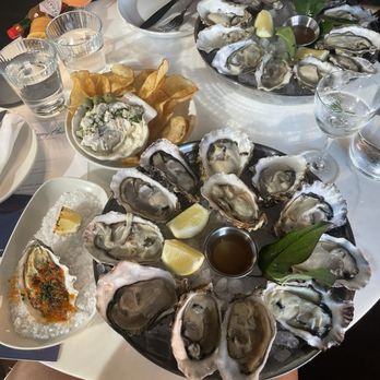 Half Shell - Happy Hour Oysters, roasted oyster, dirty martini dip, dirty shucker martini, a rose is a rose spritzer - Bars Near Me - Seattle, Washington Half Shell - Happy Hour Oysters, roasted oyster, dirty martini dip, dirty shucker martini, a rose is a rose spritzer - Bars Near Me - Seattle, Washington