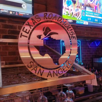 Texas Roadhouse - a bar with a large clock - Steakhouses Near Me - San Angelo, Texas Texas Roadhouse - a bar with a large clock - Steakhouses Near Me - San Angelo, Texas