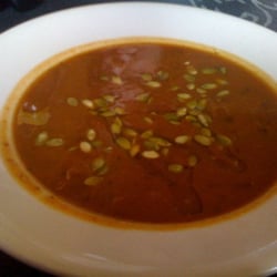 Skillet - Pumpkin-black bean soup with pepitas and a drizzle of olive oil.