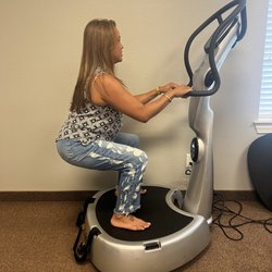 Fort Worth Health Alliance - Angela is working out on the vibratory plate after her invisaRED treatment. Helps flush out the toxins, build muscle and much, much more!