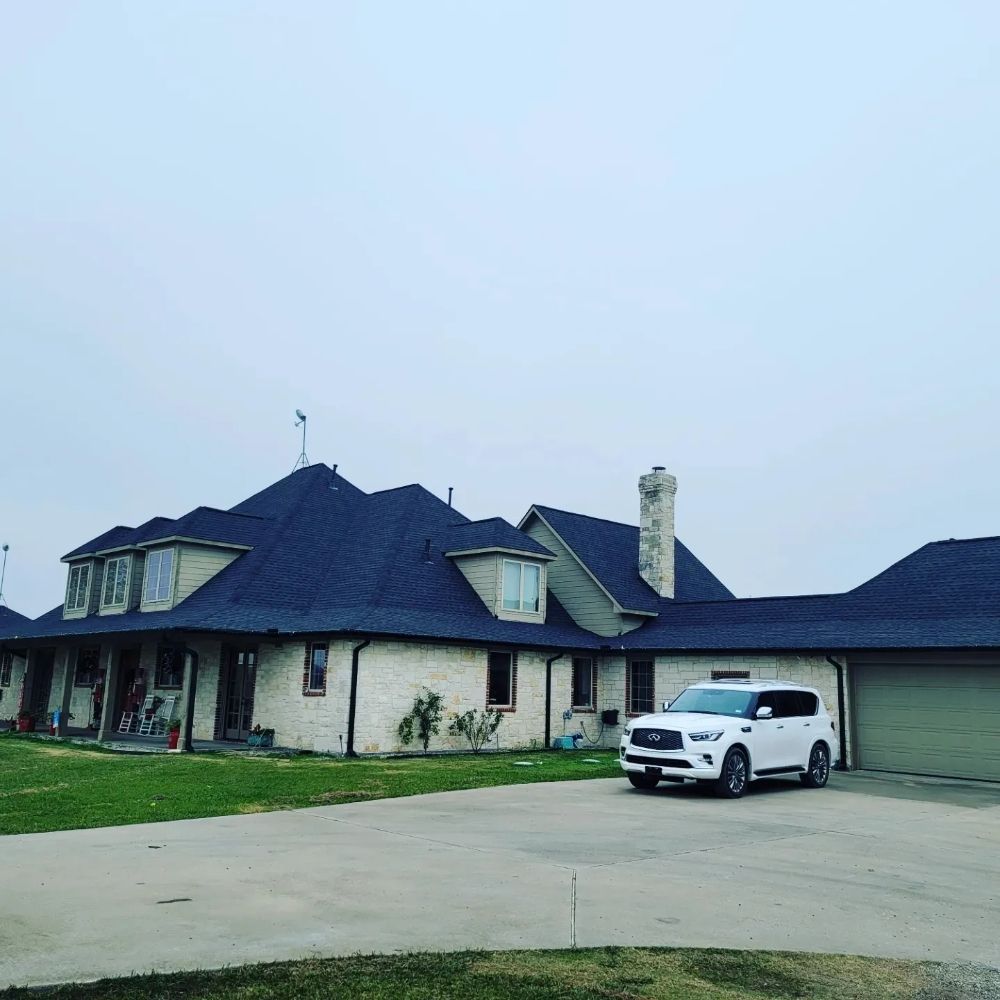 Slide of RE Roofing and Construction