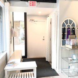 Epic Pilates Studio - Epic Pilates Studio entry foyer. Coat closet and benches.