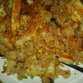 Suchard Restaurant - This is Suchard's terrible chicken special fried rice with chilli garlic and basil leaves for £9.50 for a main. - Thai Near Me - London, XGL