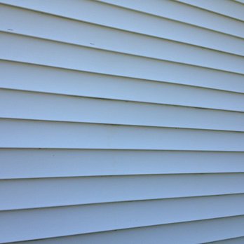 PRO-CUT Lawn Service - a side view of a house - Landscaping Near Me PRO-CUT Lawn Service - a side view of a house - Landscaping Near Me
