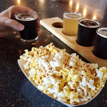 Torrent Brewing Company - Beer flight and popcorn - Breweries Near Me - Ames, Iowa Torrent Brewing Company - Beer flight and popcorn - Breweries Near Me - Ames, Iowa