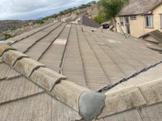 Slide of Industrious Roofing