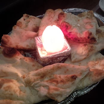 An Indian Affair - Butter naan...surrounding a glowing tomato! - Indian Near Me - Langley, British Columbia An Indian Affair - Butter naan...surrounding a glowing tomato! - Indian Near Me - Langley, British Columbia