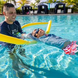Swim Express - Noodles are a great resource to develop floating skills.