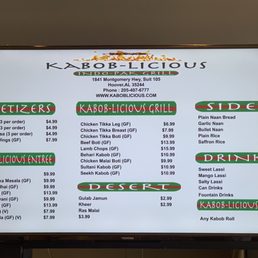 Menu on tv screen behind counter