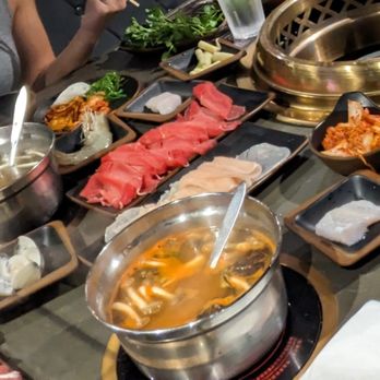 Seapot - Hotpot setup with a few cuts of beef, lamb, chicken. We tried mushroom and spicy miso broths. - Hot Pot Near Me - Plano, Texas Seapot - Hotpot setup with a few cuts of beef, lamb, chicken. We tried mushroom and spicy miso broths. - Hot Pot Near Me - Plano, Texas
