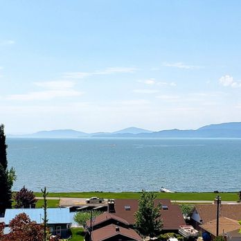 Flathead Lake Brewing Co. Pubhouse - View out back of Flathead Lake - American Near Me - Bigfork, Montana Flathead Lake Brewing Co. Pubhouse - View out back of Flathead Lake - American Near Me - Bigfork, Montana