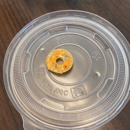 I took a bite in my food to find this hard plastic lid piece in my food. Very disappointed as they need to be more careful. I took a bite in my food to find this hard plastic lid piece in my food. Very disappointed as they need to be more careful.