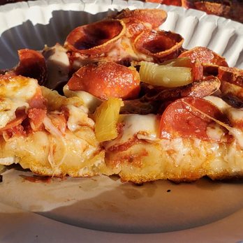 Mountain Mike's Pizza - Side view to see thickness - Pizza Near Me - Costa Mesa, California Mountain Mike's Pizza - Side view to see thickness - Pizza Near Me - Costa Mesa, California