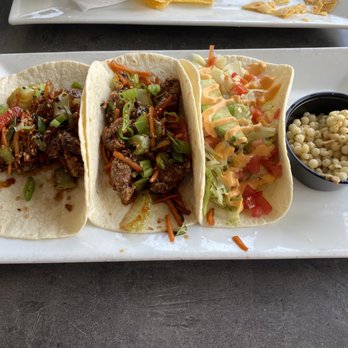 Zim Zari - Mongolian Beef Tacos, Volcano Shrimp Taco and Bacon Couscous - Burgers Near Me - Trinity, Florida Zim Zari - Mongolian Beef Tacos, Volcano Shrimp Taco and Bacon Couscous - Burgers Near Me - Trinity, Florida