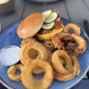 Eureka! - Double Smash Burger with bacon and side of onion rings - American Near Me - Carlsbad, California