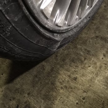 Avis - This was the front driver's side tire of the Ford Fusion I had. - Car Rental Near Me - Boston, Massachusetts