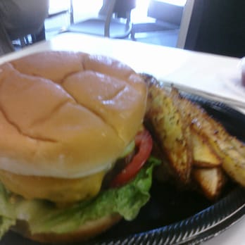 Englund's Catering - A daily special - 1/2 pound hamburger with fries. - Caterers Near Me