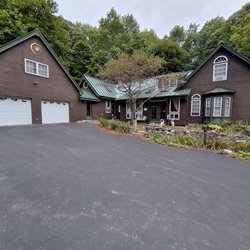 DH Pinnette & Sons - Front view of house with new metal roof
