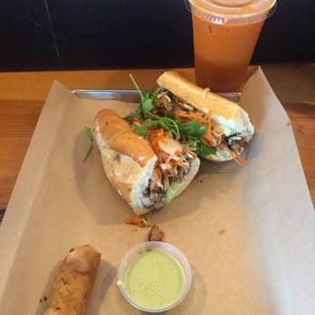 Nguyen's Kitchen - House marinated chicken sandwich with an egg roll and Thai tea! whatsup. - Vietnamese Near Me - Costa Mesa, California Nguyen's Kitchen - House marinated chicken sandwich with an egg roll and Thai tea! whatsup. - Vietnamese Near Me - Costa Mesa, California