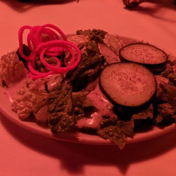 Geja's Cafe - Salad of cucumbers lettuce carrots and dressing - Fondue Near Me - Chicago, Illinois