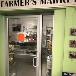 the entrance to a farmers market