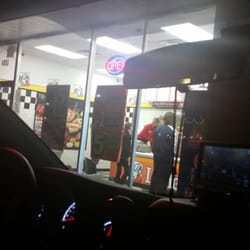 In the car, humored by all the dudes (4 including hubby) picking up pizza for their lazy wives at 9pm. Lololol.