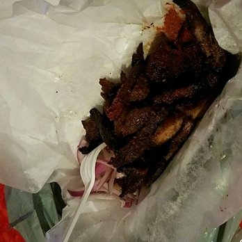 The Suya Spot - a sandwich wrapped in wax paper - African Near Me - Toronto, Ontario The Suya Spot - a sandwich wrapped in wax paper - African Near Me - Toronto, Ontario