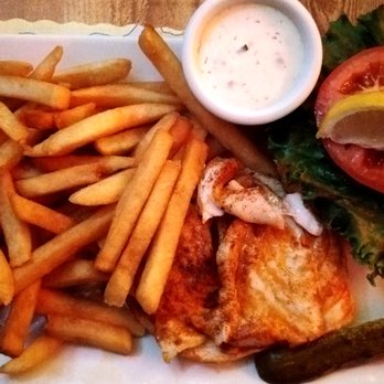 The Fish House - Grouper Sandwich, broiled. $15 Fries look well done because that's how I ordered them. - Seafood Near Me - Key Largo, Florida The Fish House - Grouper Sandwich, broiled. $15 Fries look well done because that's how I ordered them. - Seafood Near Me - Key Largo, Florida