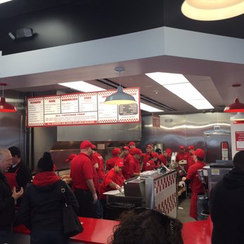 Five Guys - Crazy busy is an understatement. Line out the door and as many people standing waiting for food as there is sitting - Burgers Near Me - West Des Moines, Iowa Five Guys - Crazy busy is an understatement. Line out the door and as many people standing waiting for food as there is sitting - Burgers Near Me - West Des Moines, Iowa