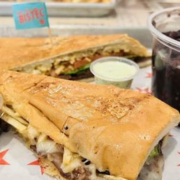 Pan con bistec with black beans and white rice