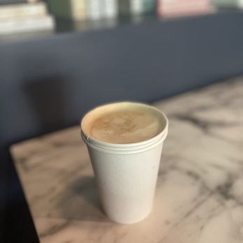 White Rhino Coffee - a cup of coffee on a marble table - Coffee & Tea Near Me - Frisco, Texas White Rhino Coffee - a cup of coffee on a marble table - Coffee & Tea Near Me - Frisco, Texas