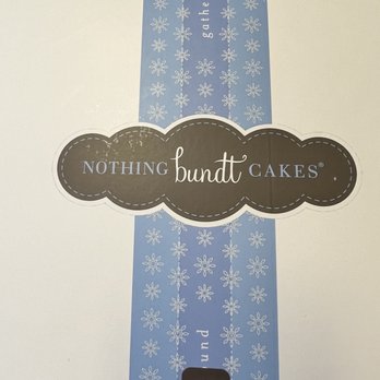 Nothing Bundt Cakes - a blue tie with white snowflakes - Bakeries Near Me - Peabody, Massachusetts