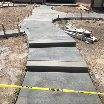 New Look Landscape - My bullnose steps with my hummingbird stamp and compass (the turtle is there, but he's a little far up) - Landscaping Near Me - Farifield, California