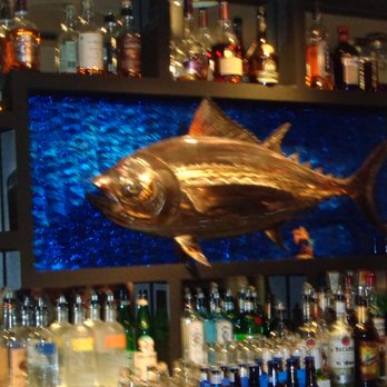 The Dutchie - Close up of Fish Adornment on Bar Back Wall - Seafood Near Me - Morro Bay, California The Dutchie - Close up of Fish Adornment on Bar Back Wall - Seafood Near Me - Morro Bay, California
