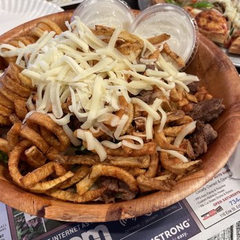 Charlie's Pub & Eatery - Steak salad with curly fries and ranch dressing - Pizza Near Me - Edinboro, Pennsylvania