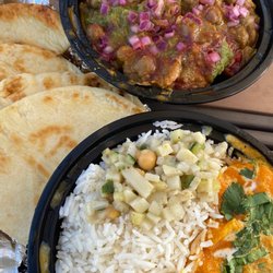 Chicken curry bowl (bottom), naan, Samosa Chaat (top)