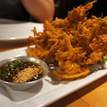 Khao San Road - gra bong-fried squash fritters battered with red curry paste, shrimp paste, and lemongras - Thai Near Me - Toronto, Ontario