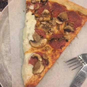 Fellini's Pizza - By the slice pizza. Got their pepperoni and mushroom. Their by the slice is made to order rather than pizza rotating, premade. - Pizza Near Me - Atlanta, Georgia