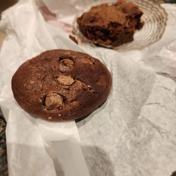 Praline Bakery - I think it is a chocolate chocolate chip cookie with a brownie in the background. I really wanted an oatmeal raisin cookie - Bakeries Near Me - Washington, DC, District of Columbia Praline Bakery - I think it is a chocolate chocolate chip cookie with a brownie in the background. I really wanted an oatmeal raisin cookie - Bakeries Near Me - Washington, DC, District of Columbia